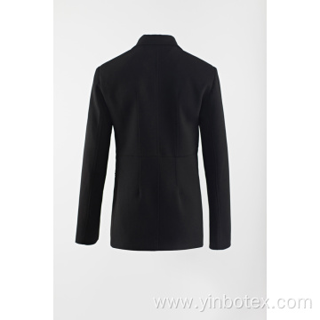 Black woven suit with pearl button